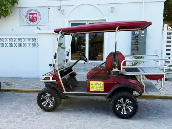 Six seater gas golf cart on the coastal road in Belize