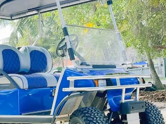 Guests with a golf cart rental in San Pedro Ambergris Caye Belize
