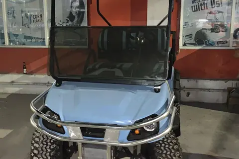 Golf cart pick up service at the water taxi terminal in San Pedro Belize